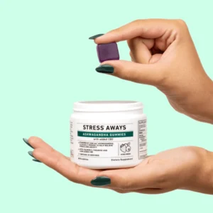 Green Roads Ashwagandha Gummies 30ct Girl Holding A Gummy In Hand